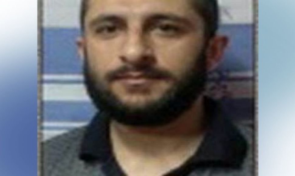 Kurdish prisoner of conscience "Kamran Sheikha", being transferred to solitary confinement