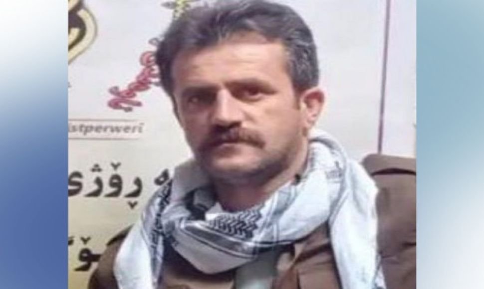 A citizen is arrested by government forces in Oshnavieh